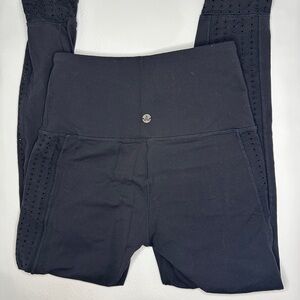 Prana Faro 7/8 Black High-Waisted Leggings with Perforated Eyelet Leg Detail